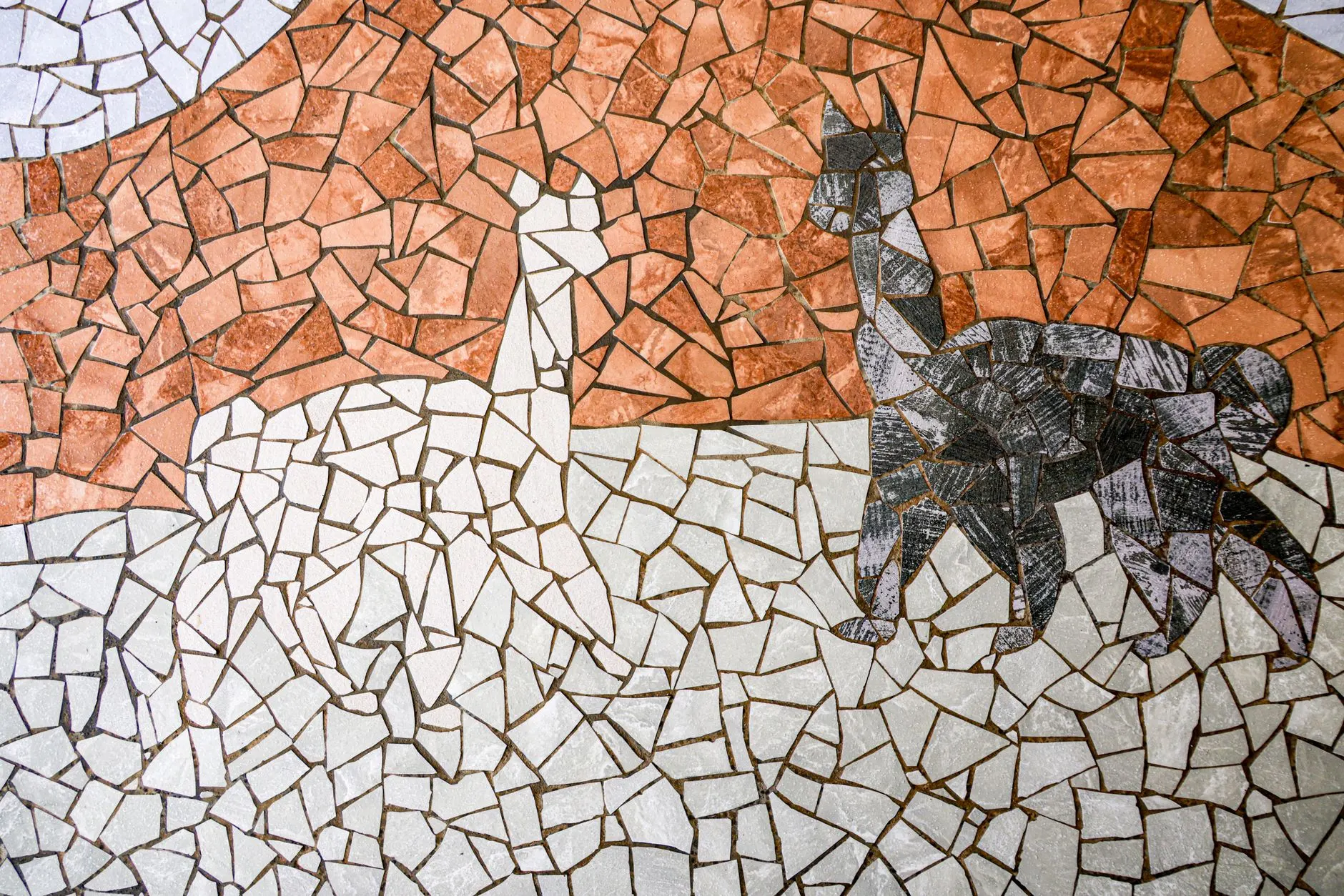 Intricate mosaic art depicting alpacas with vibrant tile patterns. Perfect for art and decor themes.